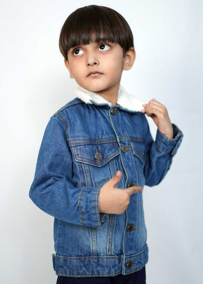Kid wearing a playful mid blue denim jacket with a cozy collar, showcasing stylish design and comfort.