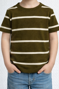 Child wearing a green and white striped shirt against a plain background